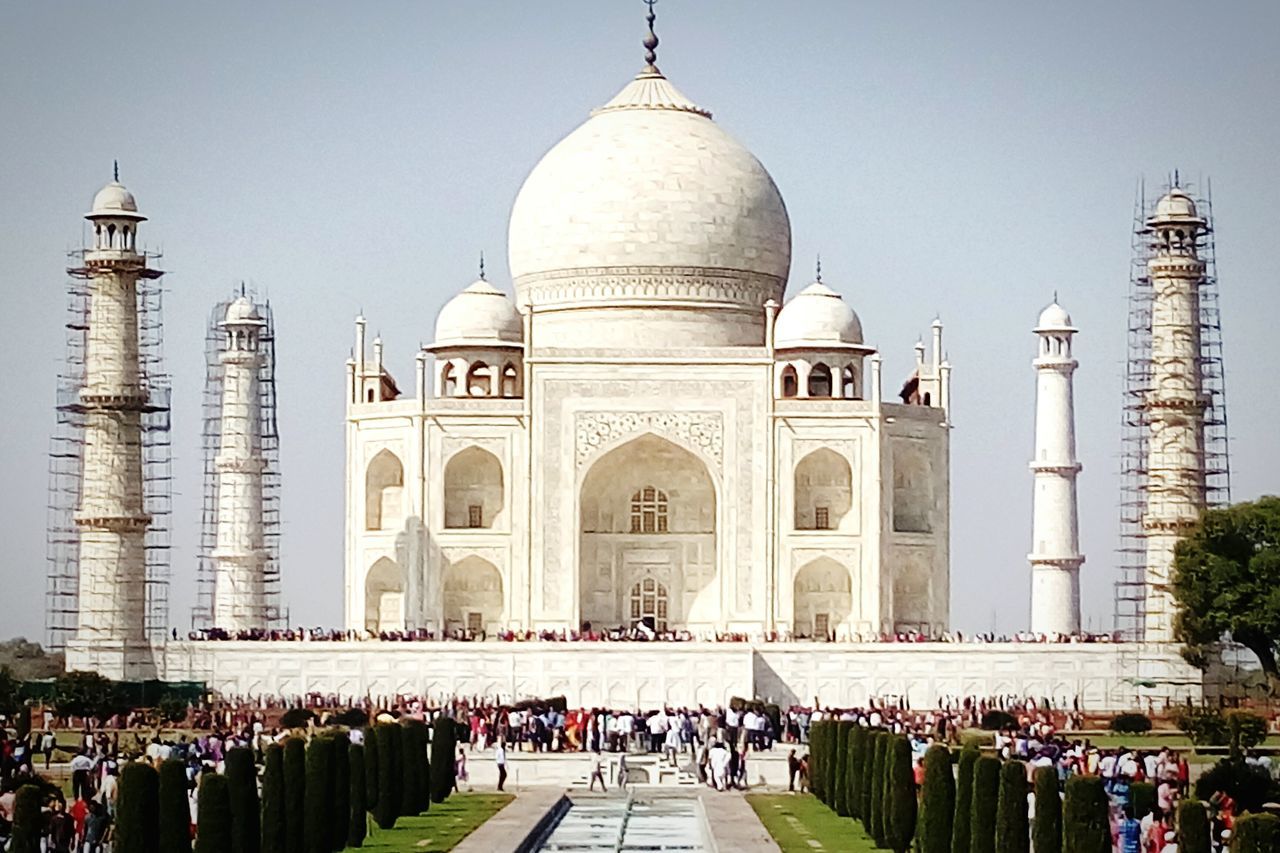 architecture, built structure, building exterior, famous place, place of worship, religion, travel destinations, tourism, dome, international landmark, spirituality, travel, cathedral, facade, large group of people, church, taj mahal, capital cities