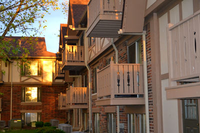 Low angle view of buildings against sky at dusk