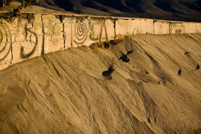 High angle view of shadow on wall