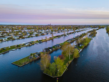 High angle view of river against sky during sunset