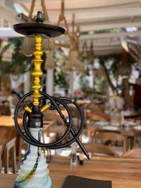 Close-up of electric lamp on table