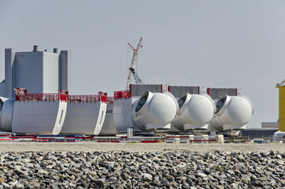 Storage of large parts of future offshore wind turbines waiting for shipping 
