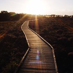 Road against sky during sunset