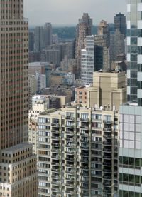 Modern buildings in city against sky