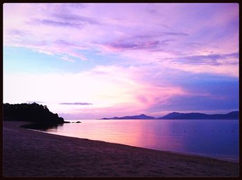 Scenic view of sea against sky at sunset