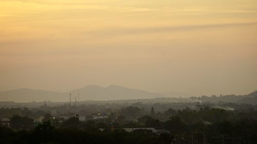 Scenic view of landscape against sky during sunset