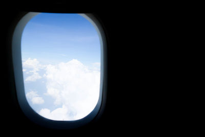 Scenic view of sky seen through airplane window