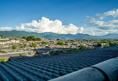 Aerial view of townscape against sky