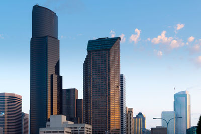 Low angle view of buildings against sky in city