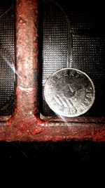 High angle view of coin in container