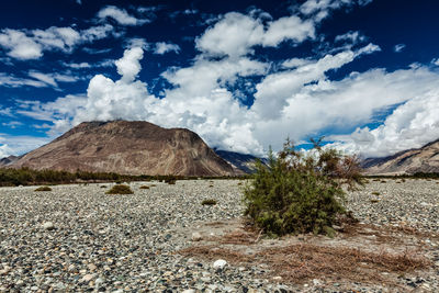 Scenic view of land against sky