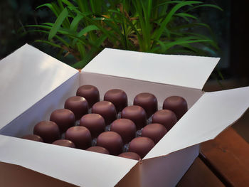 High angle view of eggs in container on table