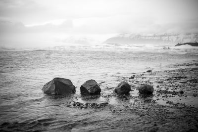 Scenic view of rocks next to ocean