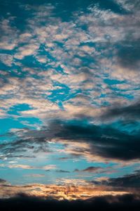 Low angle view of dramatic sky during sunset