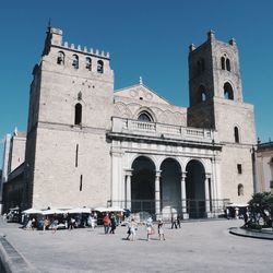 People outside cattedrale di monreale in city