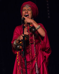 Female singer singing on stage