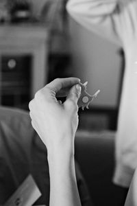 Cropped hand of man working at table