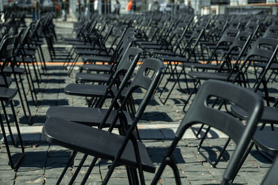 Empty chairs arranged in cafe