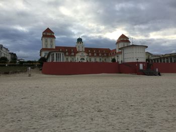 Built structure against cloudy sky