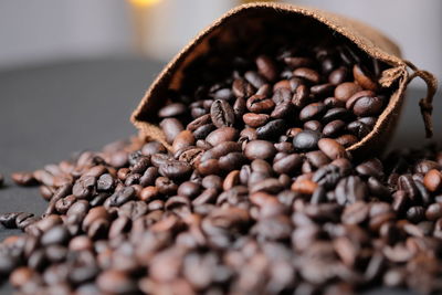 Close-up of coffee beans on table