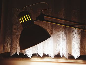 High angle view of illuminated lights on table at home