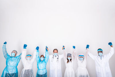 Group of people against white background