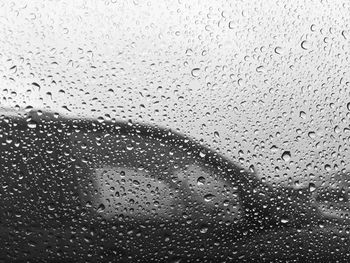 Close-up of water drops on glass