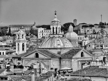 Buildings in city against sky