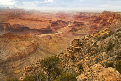 Aerial view of landscape with mountain range in background