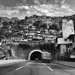 Road with buildings in background