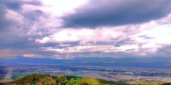 Scenic view of landscape against sky during sunset