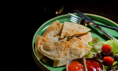 Close-up of food in plate on table