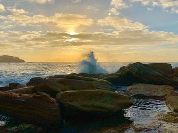 Scenic view of sea against sky during sunset