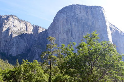 Low angle view of rock formation against sky