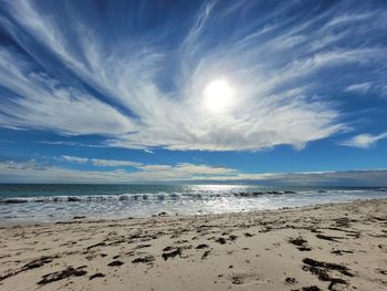 Scenic view of beach against sky