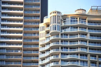 Low angle view of buildings against clear sky