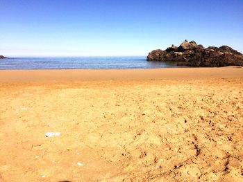 Scenic view of sea against clear sky