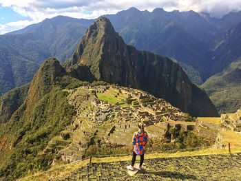 Full length of woman looking at machu pichu