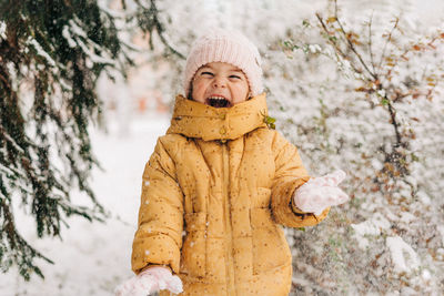 Portrait of boy in snow