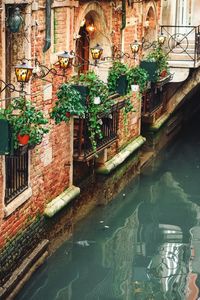 Canal amidst buildings in city