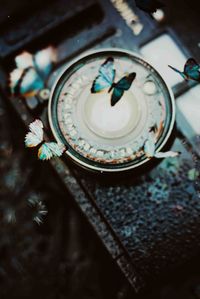 High angle view of clock on table