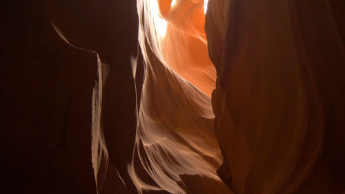 Low angle view of rock formation against wall