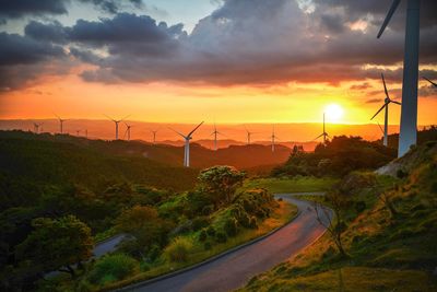 Scenic view of road against sky during sunset