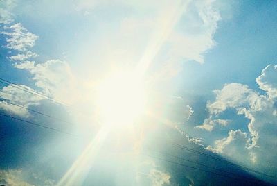 Sun shining through clouds