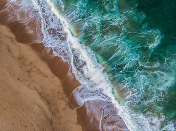 High angle view of water on beach