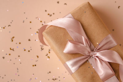 Cropped hand of woman holding gift