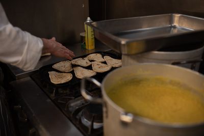 Man preparing food in kitchen