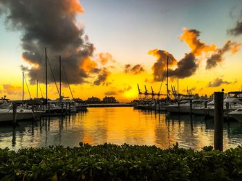 View of boats in sea during sunset