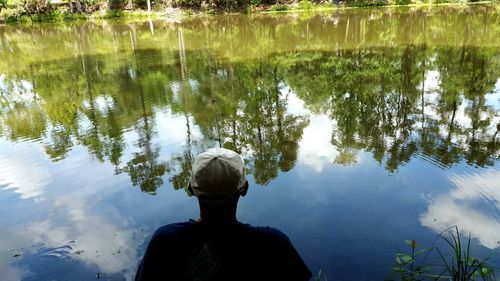 Rear view of man in lake