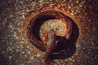 Close-up of rusty metal against wall